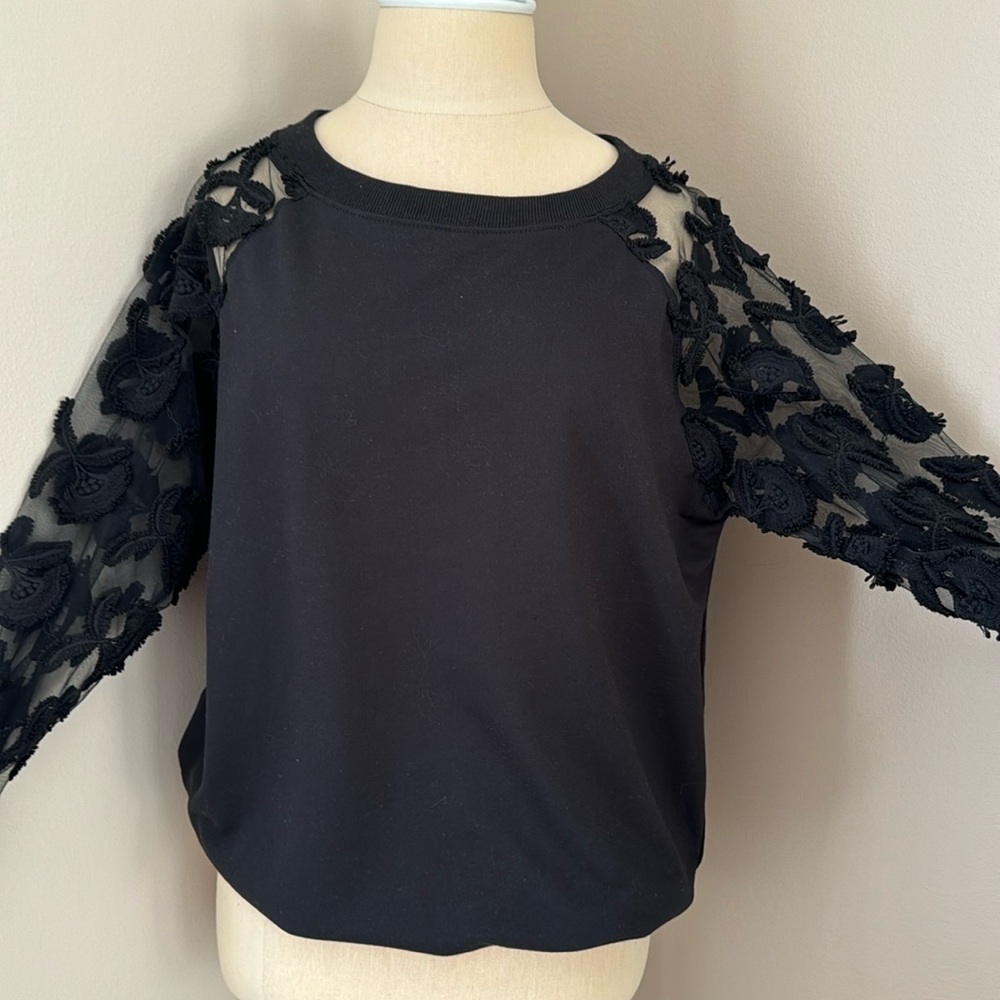 Akira Black sweat shirt with see-through flowered sleeves